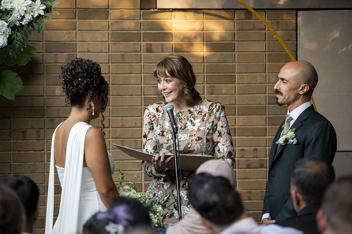 newlywed couple during wedding ceremony at Carroll Hall in Brooklyn