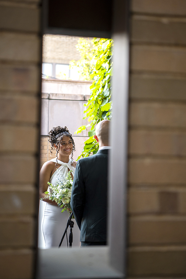 newlywed couple during wedding ceremony at Carroll Hall in Brooklyn