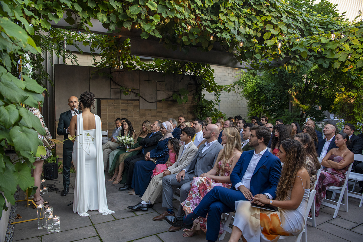 newlywed couple during wedding ceremony at Carroll Hall in Brooklyn