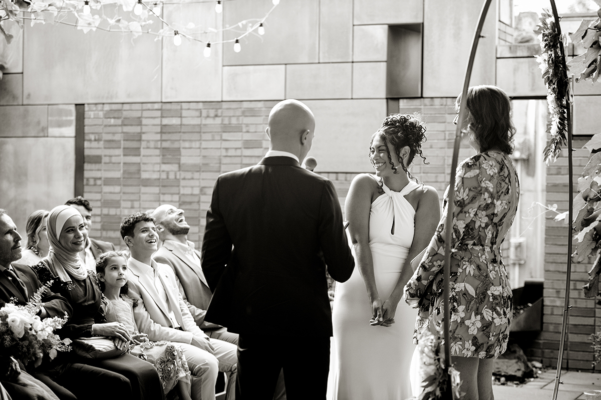 newlywed couple during wedding ceremony at Carroll Hall in Brooklyn
