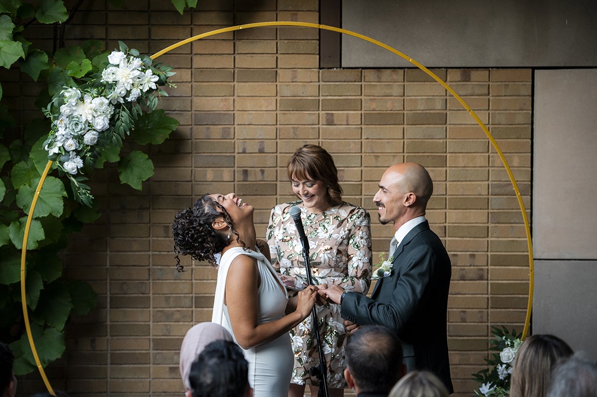 newlywed couple during wedding ceremony at Carroll Hall in Brooklyn