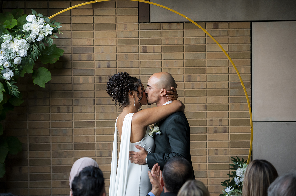 newlywed couple during wedding ceremony at Carroll Hall in Brooklyn