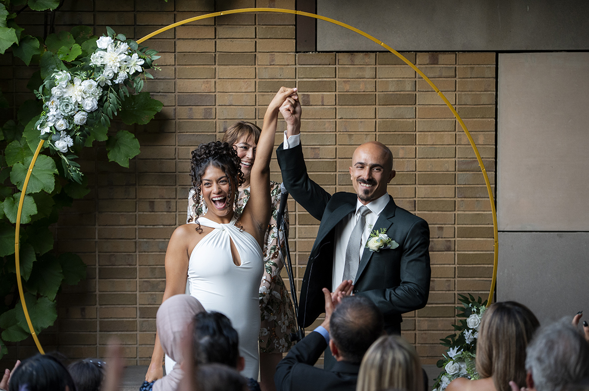 newlywed couple during wedding ceremony at Carroll Hall in Brooklyn