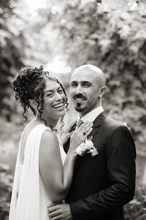 newly wed couple posing for portrait during wedding at Carroll Hall in Brooklyn