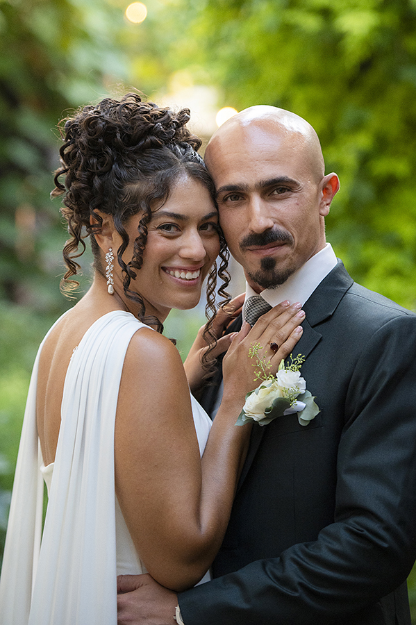 newly wed couple posing for portrait during wedding at Carroll Hall in Brooklyn