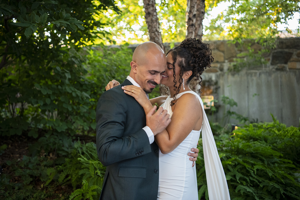 newly wed couple posing for portrait during wedding at Carroll Hall in Brooklyn