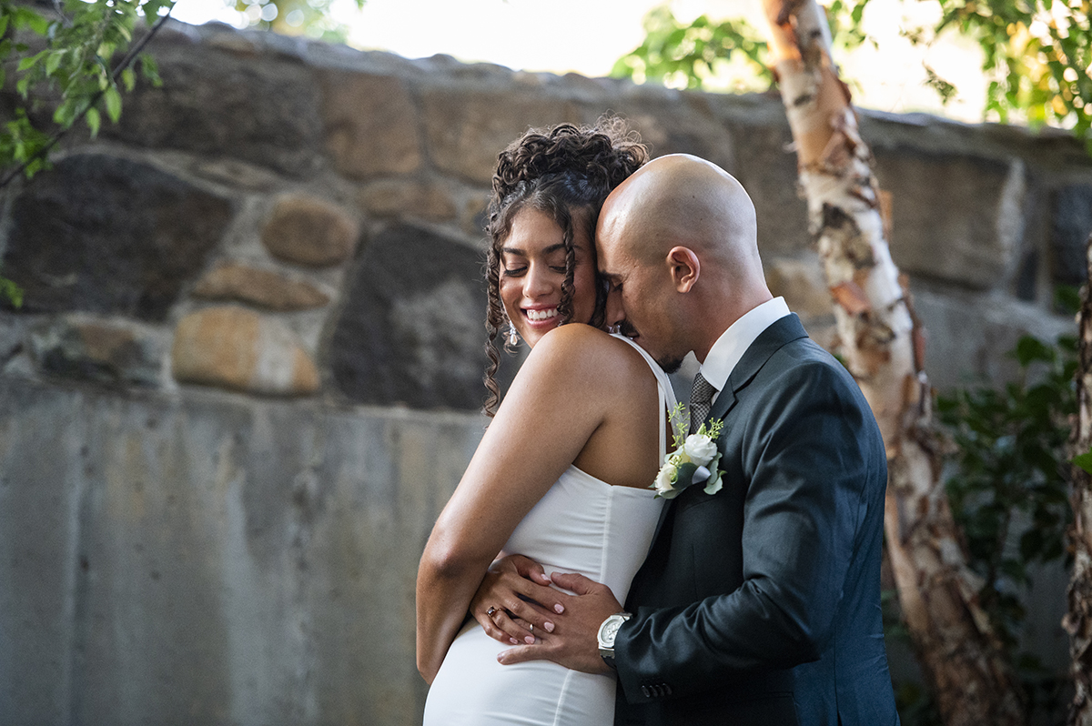 newly wed couple posing for portrait during wedding at Carroll Hall in Brooklyn
