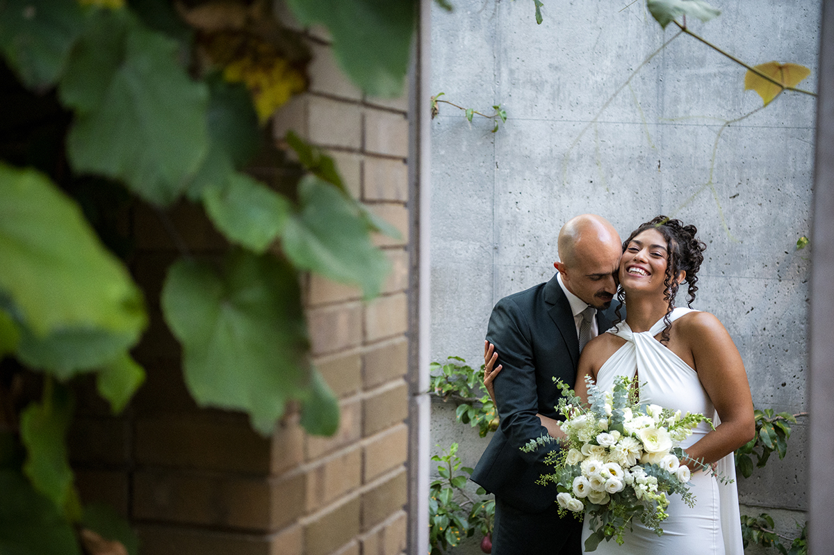 newly wed couple posing for portrait during wedding at Carroll Hall in Brooklyn