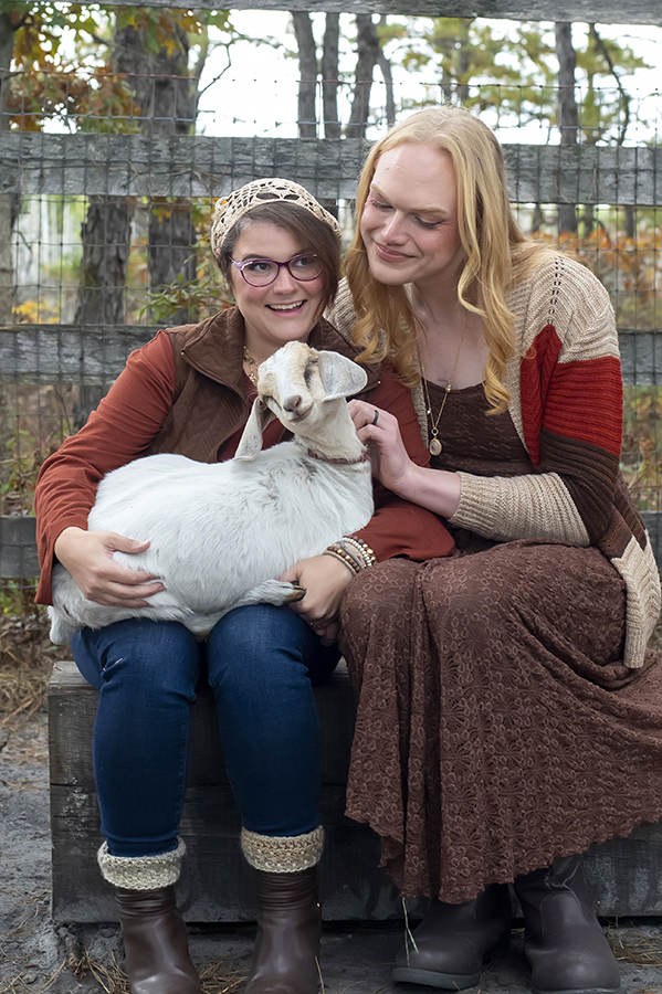 same sex engaged couple at farm for fall engagement photos