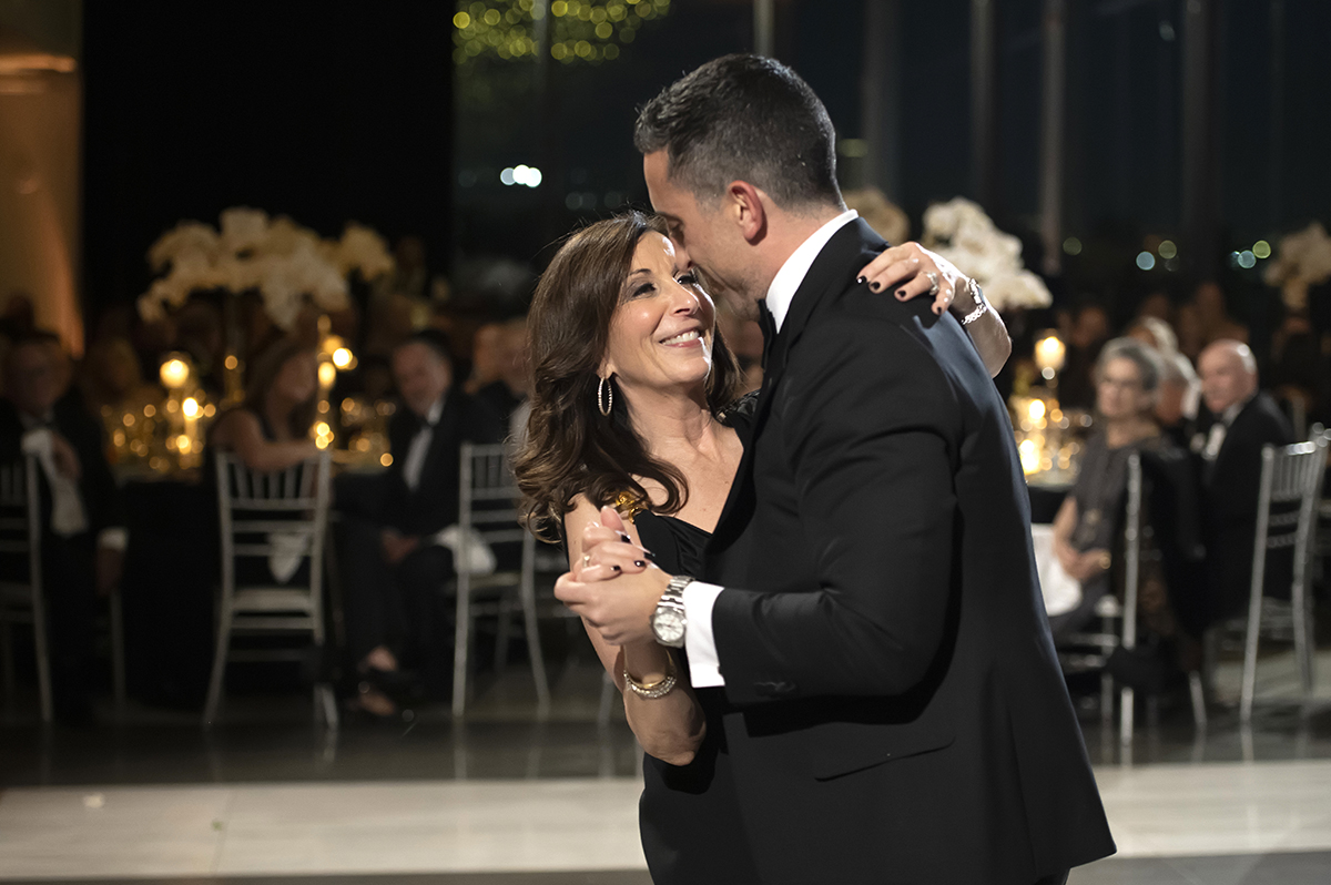 groom and his mother dancing at Hudson House wedding