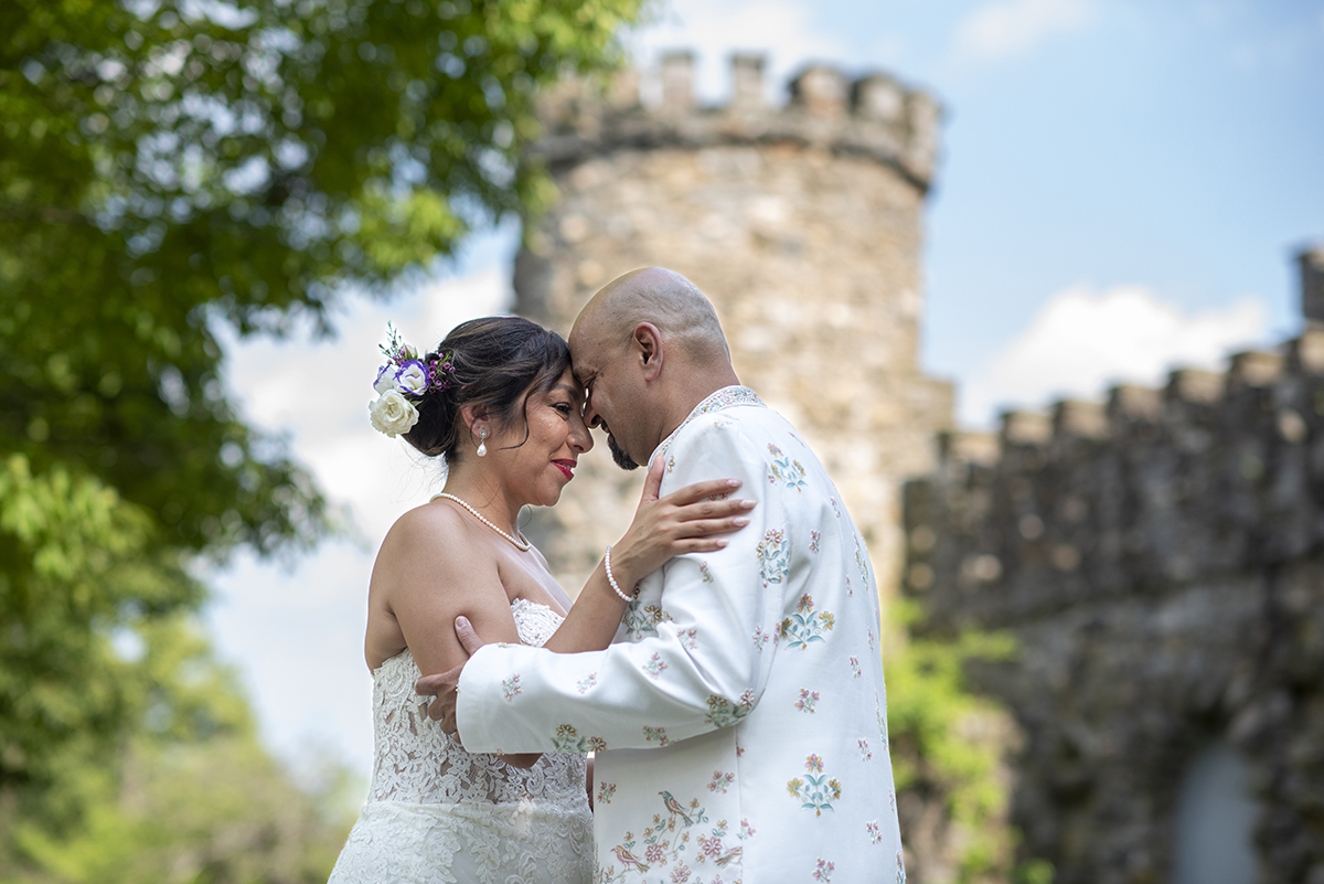 bride and groom posing for portraits on their wedding day at Glen Island Harbour Club
