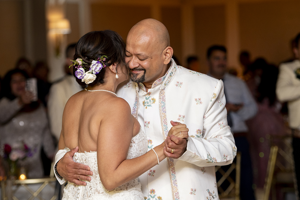 bride and groom dancing during their wedding reception at Glen Island Harbour Club