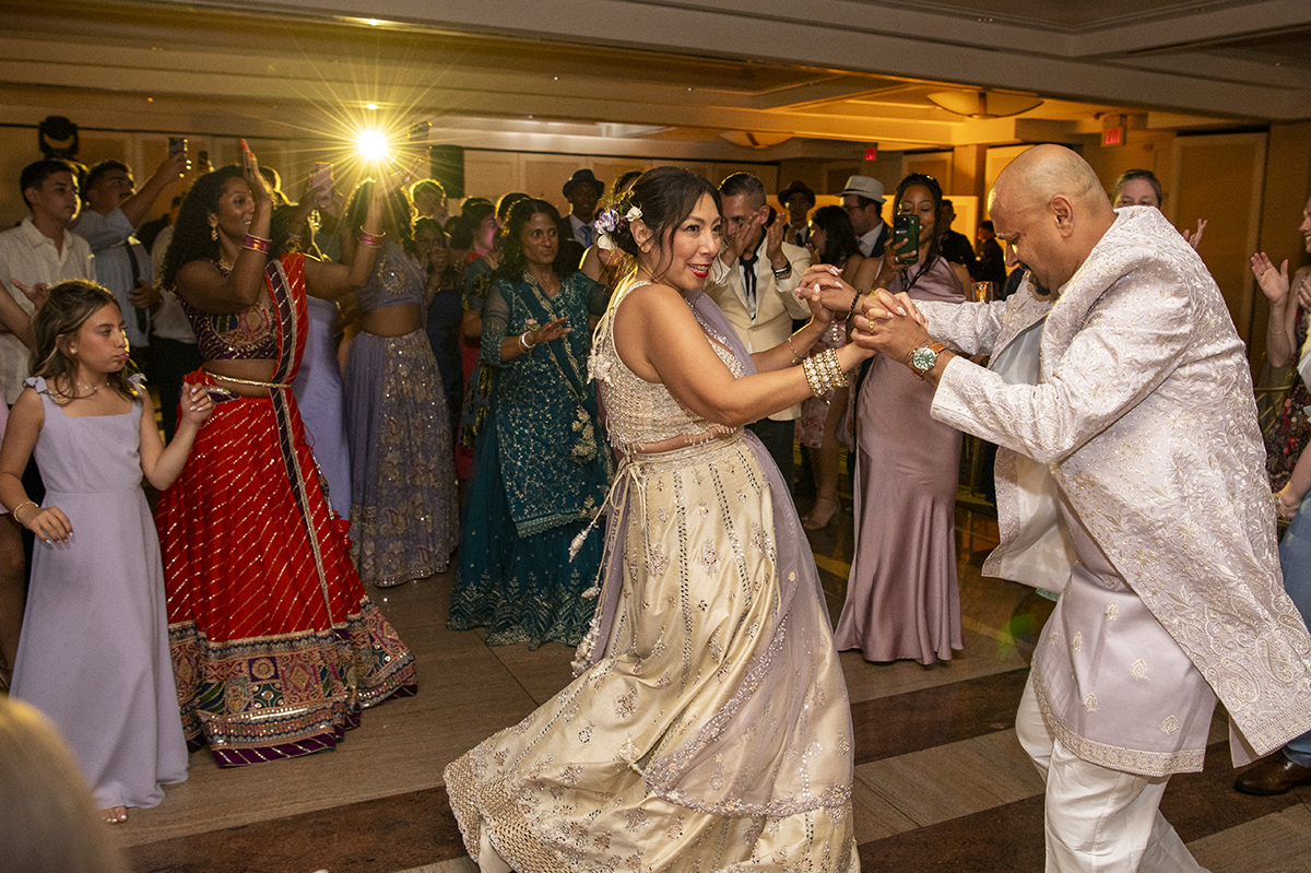 bride and groom dancing during their wedding reception at Glen Island Harbour Club